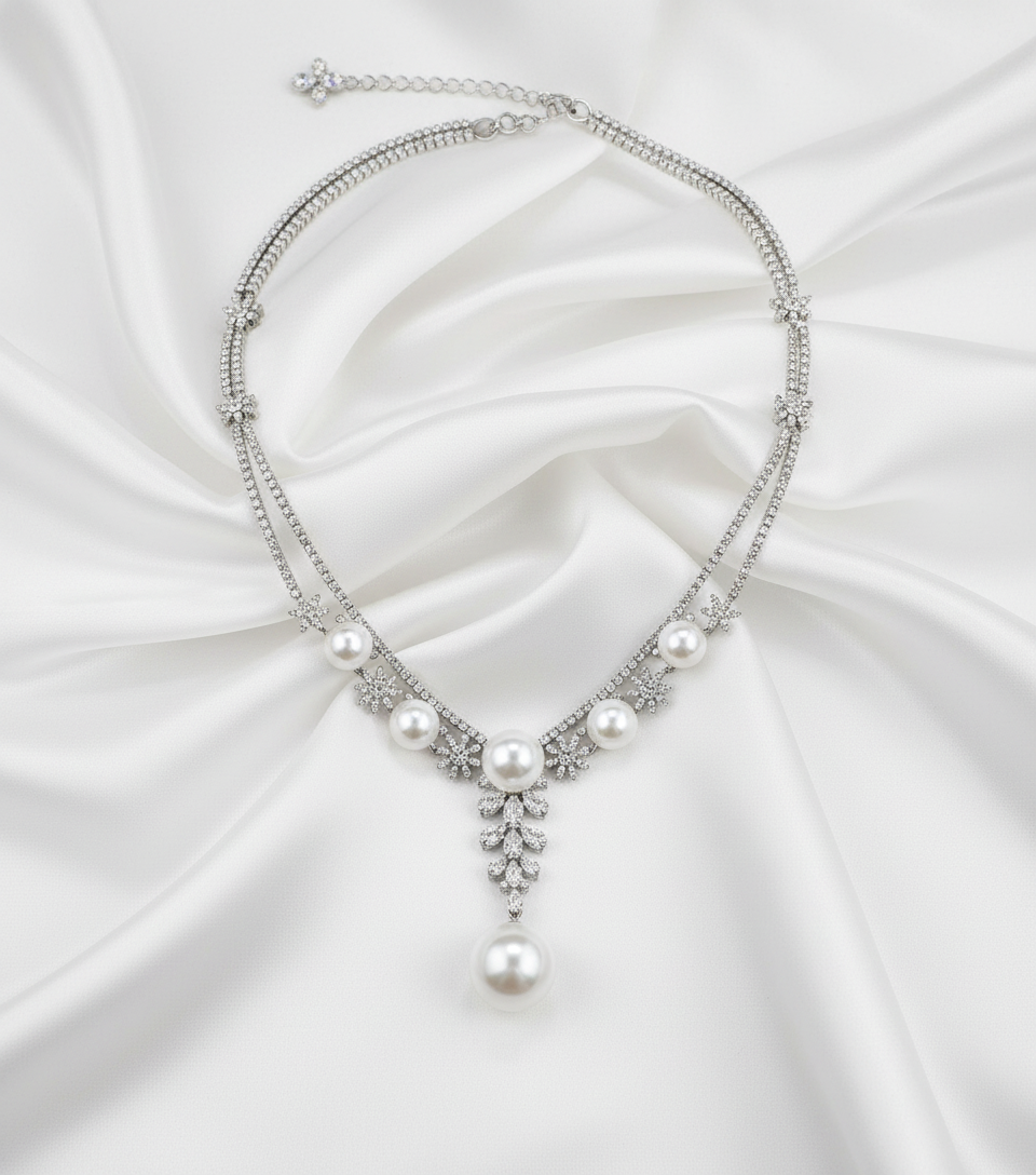 Flat lay on white silk